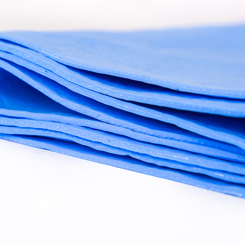 Blue PVA towel side view showing towel thickness